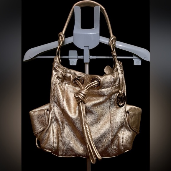 Michael Kors Metallic Gold Leather Drawstring Shoulder Bag. - Picture 1 of 16